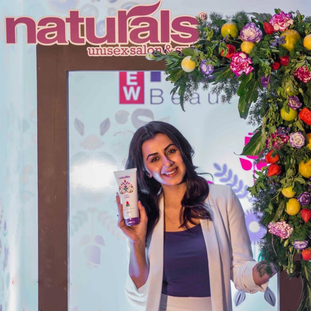 Naturals product launch event in Hyderabad with creative branding, stage design and audience engagement.